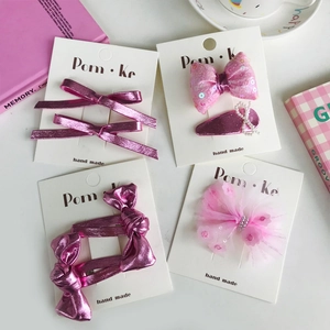 Set de pinzas para el pelo rosa para niñas con lentejuelas, perlas y lazos de encaje