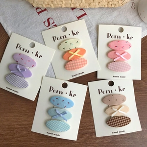 Handmade floral and plaid fabric oval hair clips for children in five stylish color sets