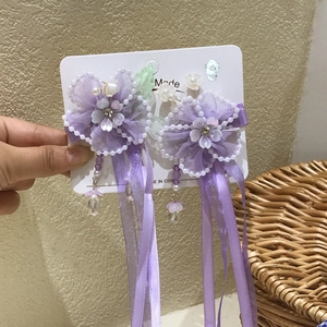 Paire de pinces à cheveux Hanfu violettes avec fleurs en tulle et longs glands