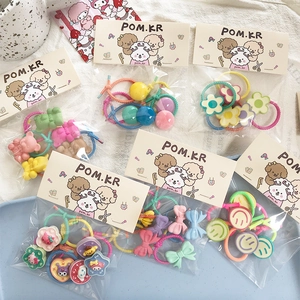 Detailed set of cute elastic hair ties with colorful cartoon bears, flowers and bows