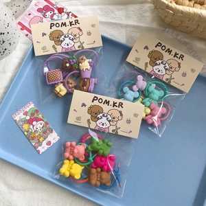 Colorful kids hair ties set with cartoon bear and flower charms in pastel candy colors