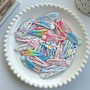 Cute printed teardrop snap hair clips with colorful polka dots and star patterns