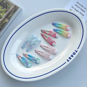 Colorful printed metal snap hair clips set with marble and rainbow patterns for girls