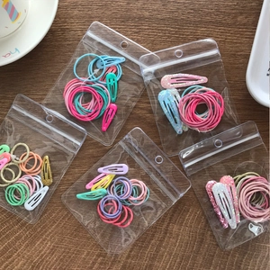 Cute colorful kids hair ties and sequin glitter BB clips set in transparent packaging