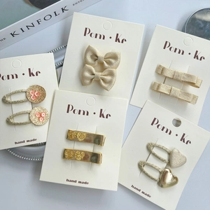 Ensemble chic de 5 paires de barrettes à cheveux avec nœuds en cuir et cœurs à paillettes