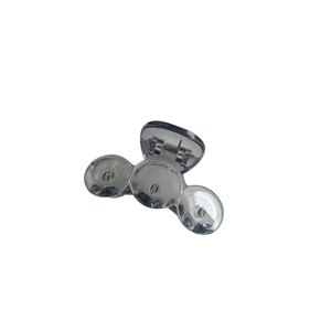 Translucent grey acrylic mini hair claw clip with a three-circle design and metal spring