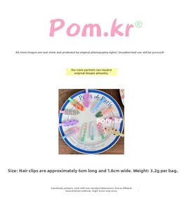 Macro detail of candy-colored matte hair clips with plaid and floral patterns on a white plate