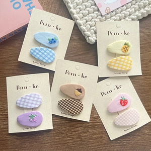 Close-up of 5 pairs of Korean fabric hair clips with fruit embroidery and plaid patterns
