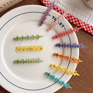Cute star and flower metal hair clips in macaron colors for girls hair styling
