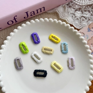Set of 10 colorful candy-colored knitted hair clips for girls in various pastel shades