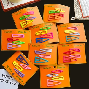 Colorful Korean matte BB hair clips in assorted geometric shapes on orange display cards