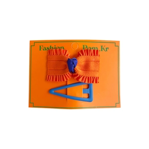 Fashionable orange bow hair clip set with blue triangle geometric clip on display card