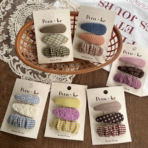 Pastel fabric plaid drop hair clips set for girls featuring polka dots and floral patterns