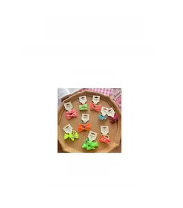 Neon knotted bow hair ties in various colors with a 4cm diameter and 2.8g weight
