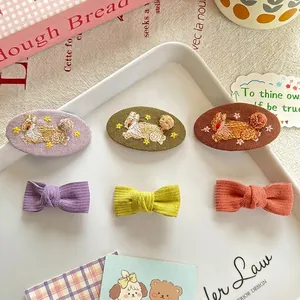 6-piece Korean style girls' hair clip set with rabbit embroidery and colorful ribbon bows