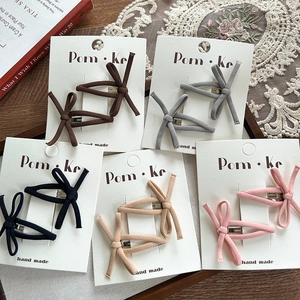 Elegant fabric bow hair clips for women in five assorted colors with a metal duckbill design