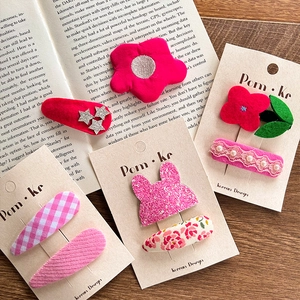 Lot de jolies barrettes coréennes en tissu avec perles et oreilles de lapin sur livre