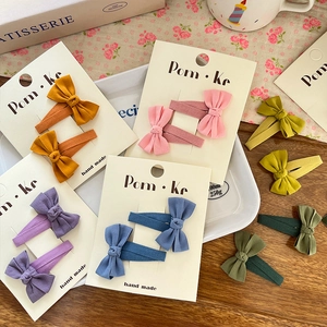 Set of handmade colorful bow hair clips in vibrant cotton linen for sweet girls