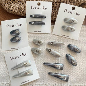 Lot de barrettes à cheveux en cuir argenté avec charms cœur papillon et étoile