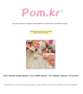 Détail du set d'accessoires de cheveux princesse rose avec voile en dentelle et perles