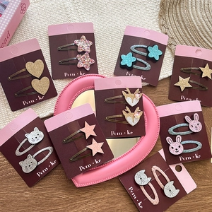 Barrettes à paillettes en forme d'étoile et de cœur pour filles sur présentoir