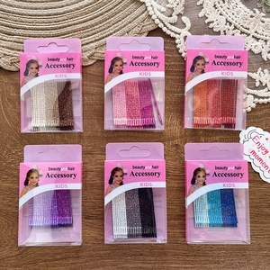 Detailed set of glittery bobby pins in multiple colors for kids hair styling