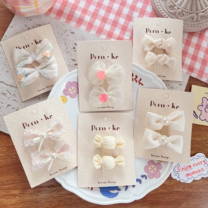 Set of creamy pearl bow hair clips for girls in various sweet Korean styles and colors
