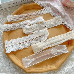 Handmade embroidered lace baby headbands set in elegant white and beige floral styles