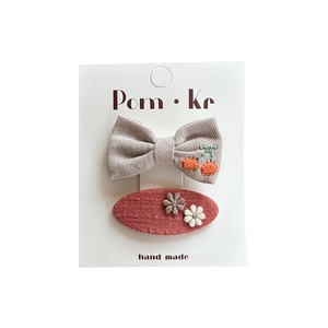 Handmade fabric hair clips set with cherry bow and floral patterns on card