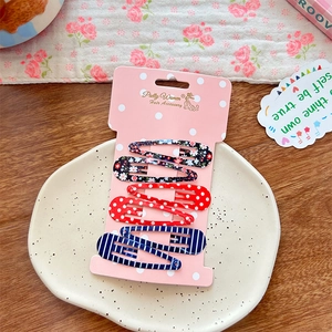 6-pack colorful polka dot and floral print metal drop hair clips for girls on pink card