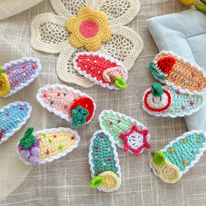 Handmade crochet fruit hair clips set featuring strawberry apple and grape for kids