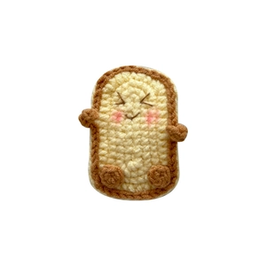 Handmade crochet ice cream toast hair clip for kids featuring cute embroidery details