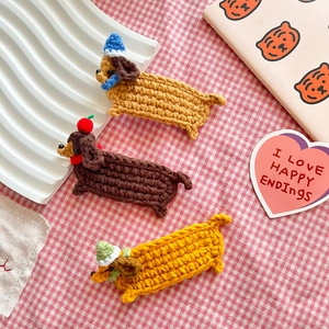 Handmade crochet dachshund hair clips in brown and yellow with cute knitted mini hats