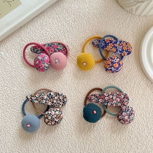 Ensemble de barrettes et chouchous à fleurs en rose, jaune, bleu et vert pastel