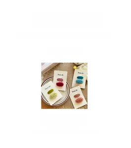 Detailed size view showing 4cm candy-colored plush handmade hair clips for toddlers