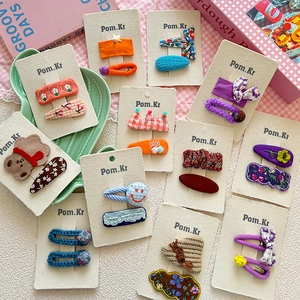 Set mit bunten koreanischen Haarspangen aus Stoff mit Bär und Schleife für Kinder