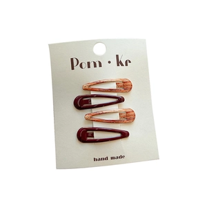 Set of four floral water-drop BB hair clips in amber and wine red for women