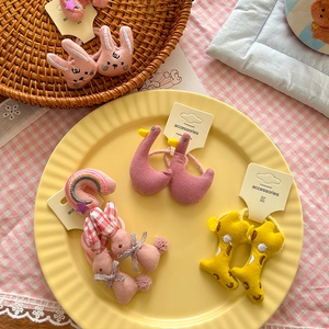 Cute cartoon plush scrunchies featuring rabbit and swan shapes in soft knitted cotton