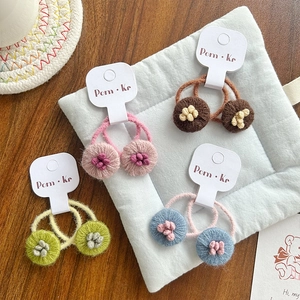 Lot de chouchous fleurs tricotés main pour enfants en rose, marron, vert et bleu