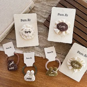 Set molletta per capelli in pizzo e elastico per bambine colori caffè al latte
