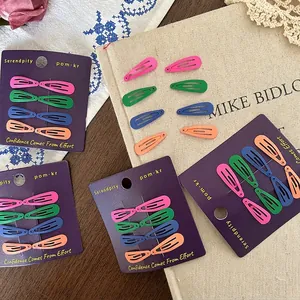 Colorful matte snap hair clips for kids in candy colors on card packaging