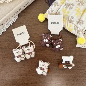 Set carino di fermagli per capelli ed elastici con orsetto di peluche in stile coreano
