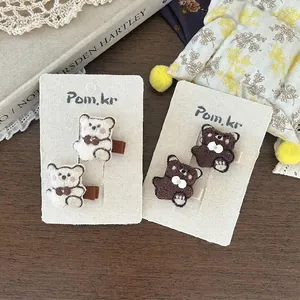 Simpatiche mollette per capelli a forma di orso ricamate in beige e marrone