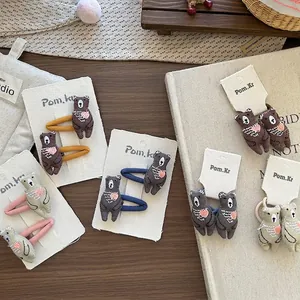 Ensemble de barrettes et chouchous ours brodés pour enfants dans des tons naturels de marron