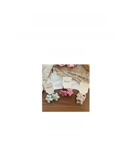 Detailed view of handmade star plaid fabric hair ties set with 3.5cm diameter size
