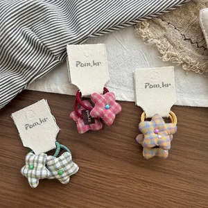 Star-shaped plaid fabric hair scrunchies set in green, pink and purple with high elasticity