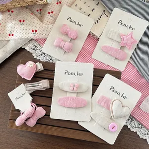 Süße Stoffhaarklammern Set für Kinder mit rosa Herzen, Sternen und Schleifen Motiven