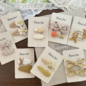Koreanischer Stil Cremegelb Stoff Schleife Blume Haarklammern Für Kinder Mädchen Süß Punktmuster Künstliche Perle Haarnadeln