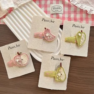 Cute 4-piece embroidered bird and fruit hair clips with pearls and knit details