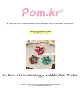 Detail view of handmade knitted star hair clips with colorful polka dots and wooden buttons